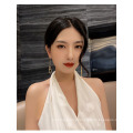 Chinese Custom Stainless Steel Asymmetrical Tassel Earrings For Women 2021